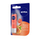 NIVEA Lip Balm, Fruity Strawberry & Peach Shine - Long-lasting Moisturization
